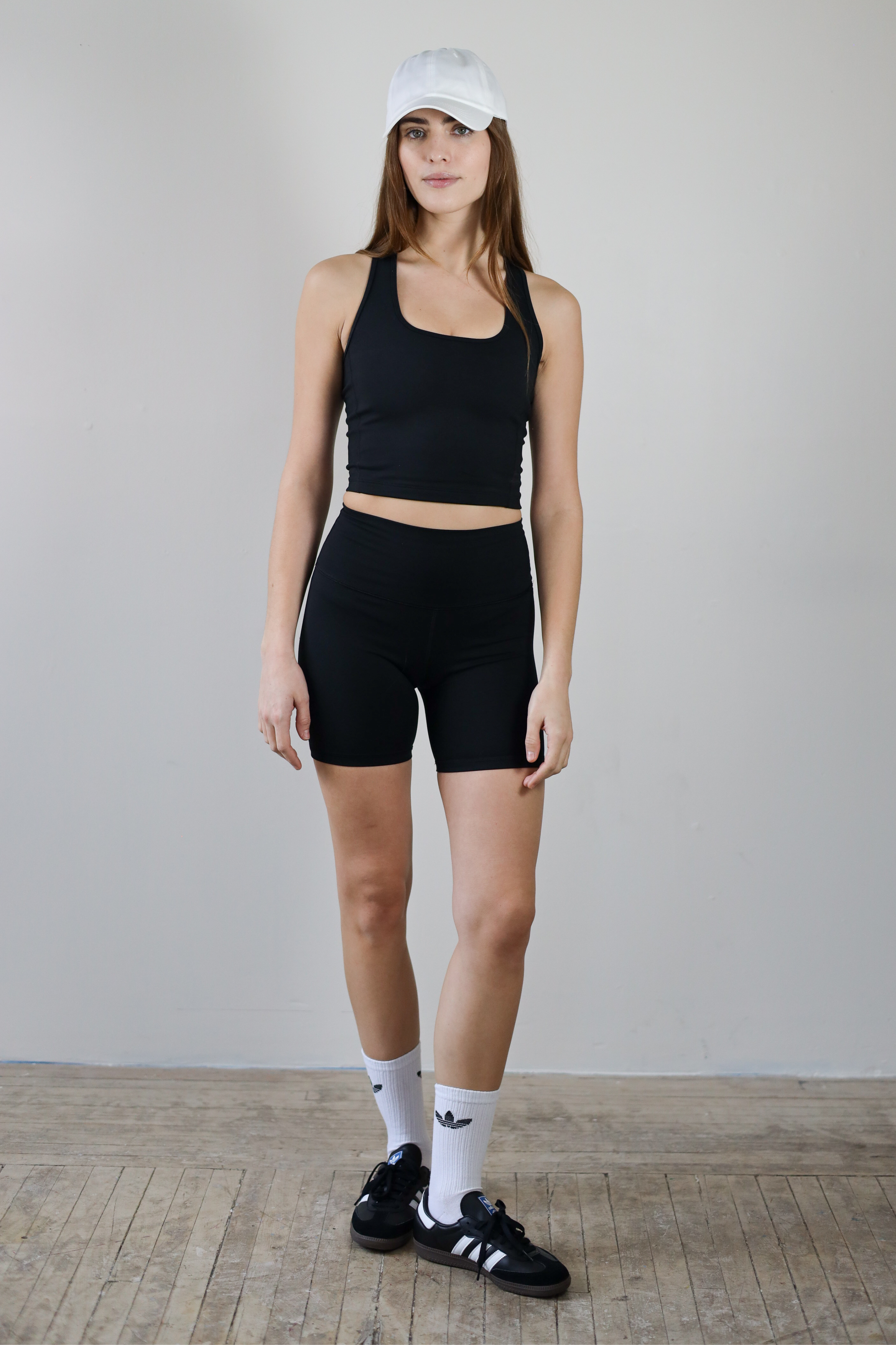 Premium black high-waisted bike shorts for wholesale – buttery-soft, squat-proof, and moisture-wicking. Perfect for brands to customize and private label. Designed for ultimate comfort and performance in athleisure and activewear collections.
