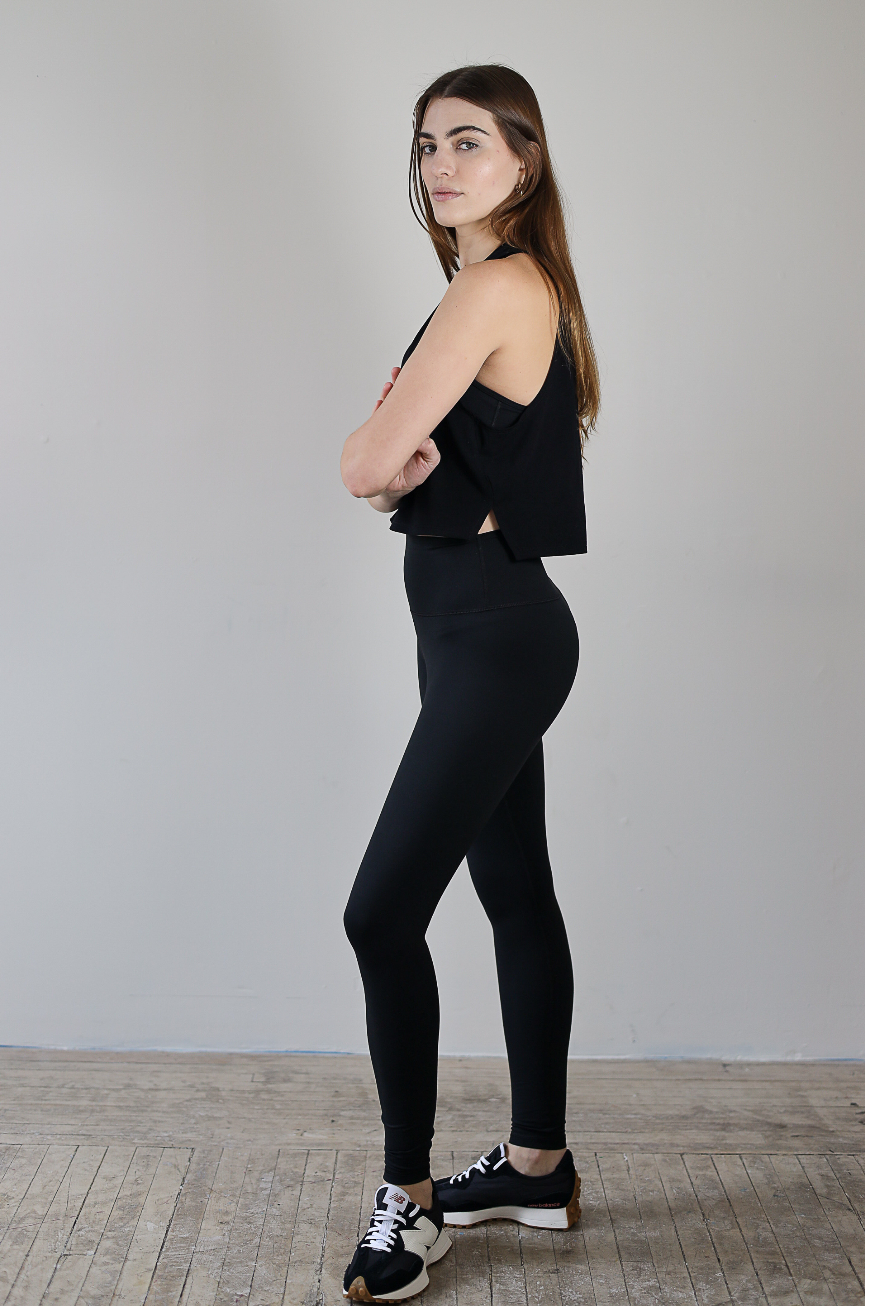 Premium black high-waisted leggings for wholesale – buttery-soft, squat-proof, and moisture-wicking. Designed for brands to customize and private label. Perfect for athleisure and activewear collections with a sleek, performance-driven fit.