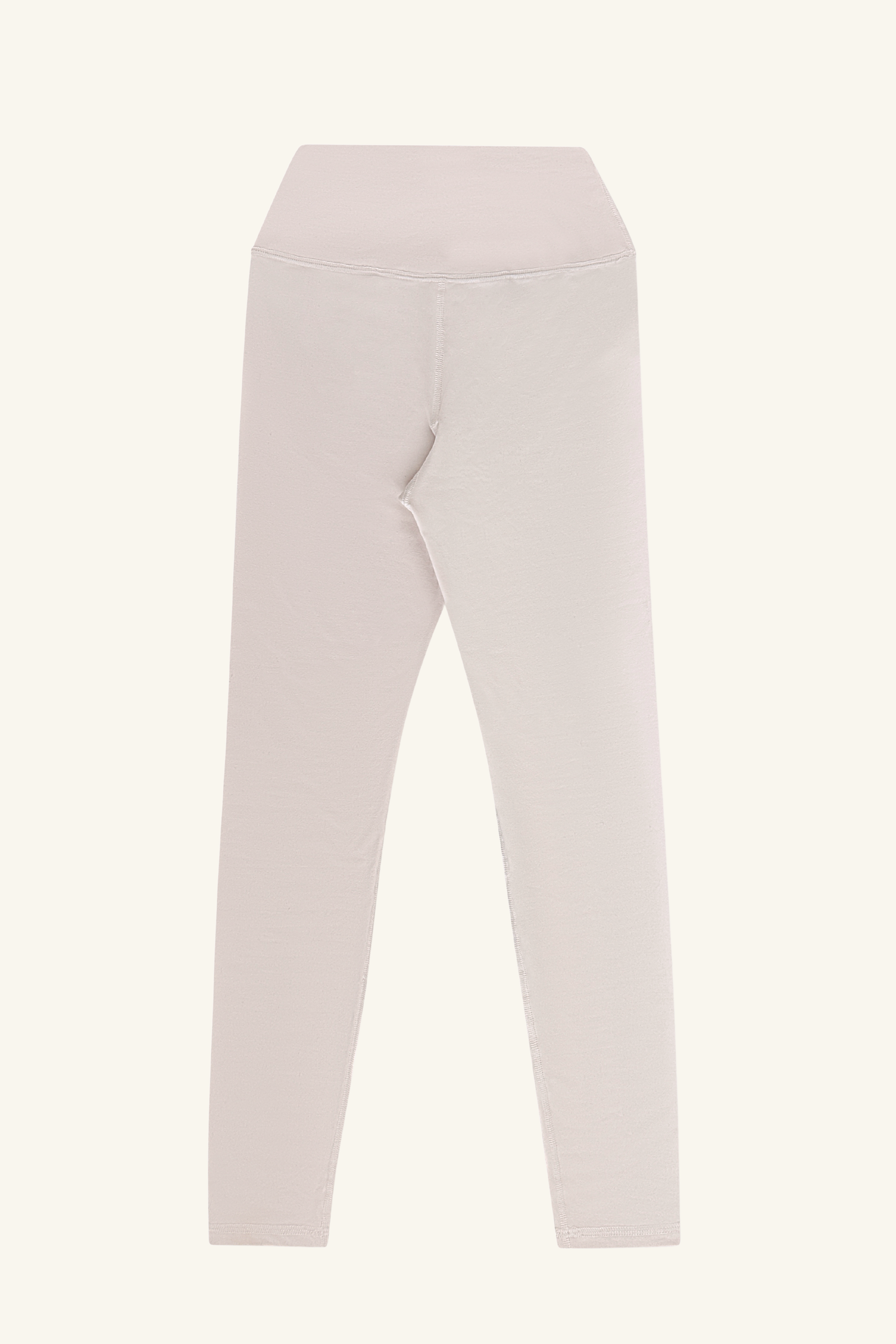 Premium ecru high-waisted leggings for wholesale – buttery-soft, squat-proof, and moisture-wicking. Designed for brands to customize and private label. Ideal for athleisure and activewear collections with a sleek, performance-driven fit.